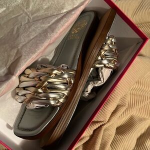 Brand new never worn. Vince Camuto sandals. Size 11M metallic silver and gold.